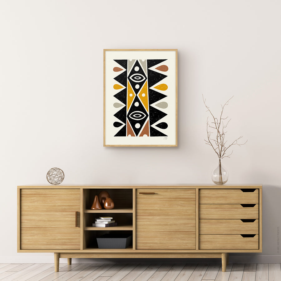 Black and earth colored totem inspired by mid-century design framed in room. Bamboo art print by Erik Abel
